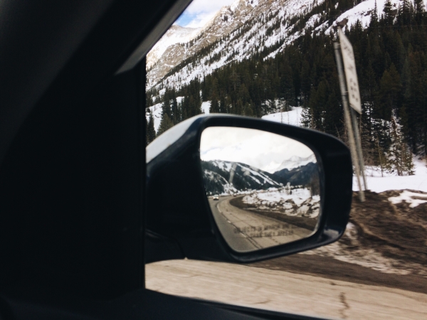 view-from-the-car-side-mirror-on-snowy-mountains-2022-11-15-02-20-19-utc.jpg
