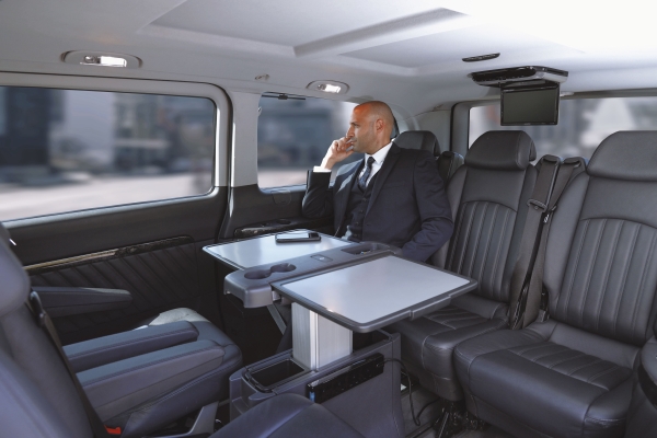businessman-with-a-suit-sitting-inside-a-car-looki-2023-04-26-00-23-30-utc.jpg